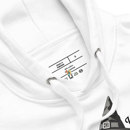 Close-up of a white garment with a label on a white background