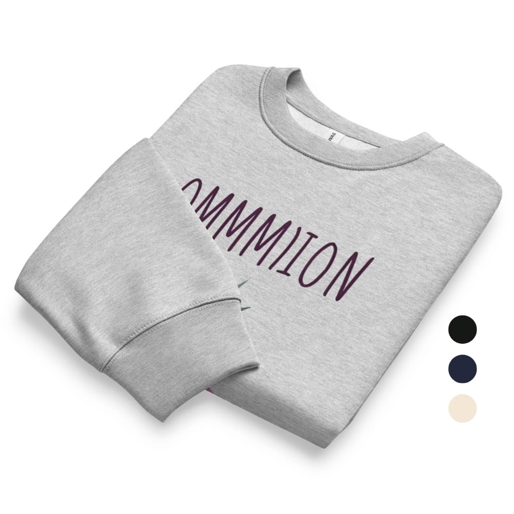 Folded gray sweatshirt with 'MOMMY' printed in purple on a white background