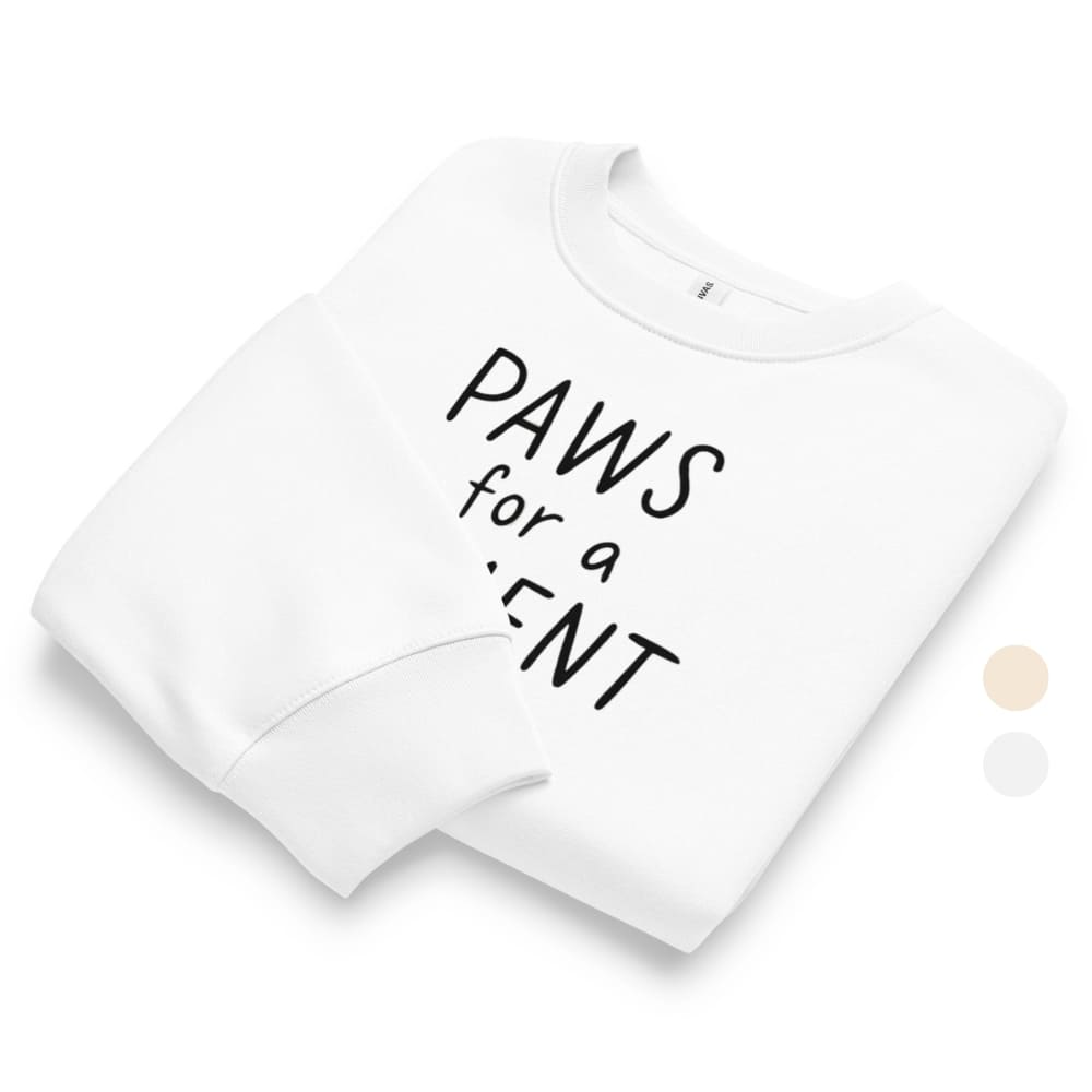 White t-shirt with 'PAWS for a reason' text on a white background