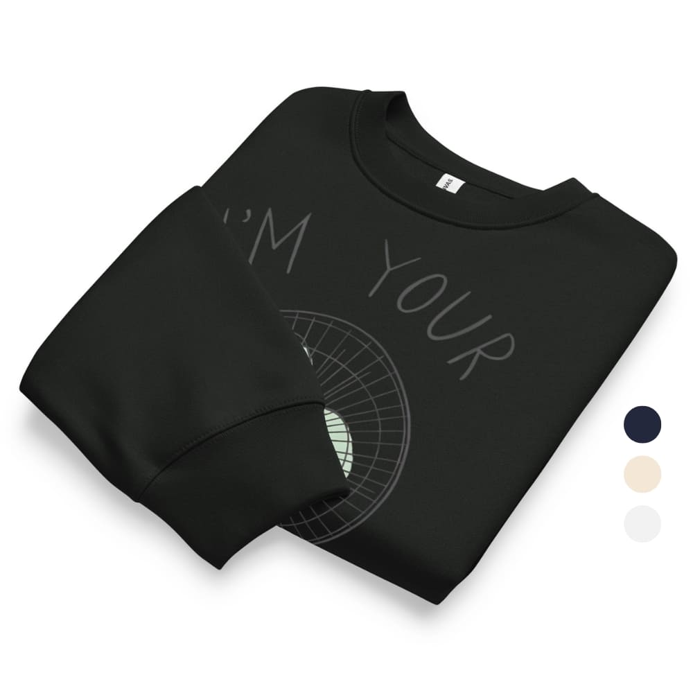 Folded black sweatshirt with text and design on a white background