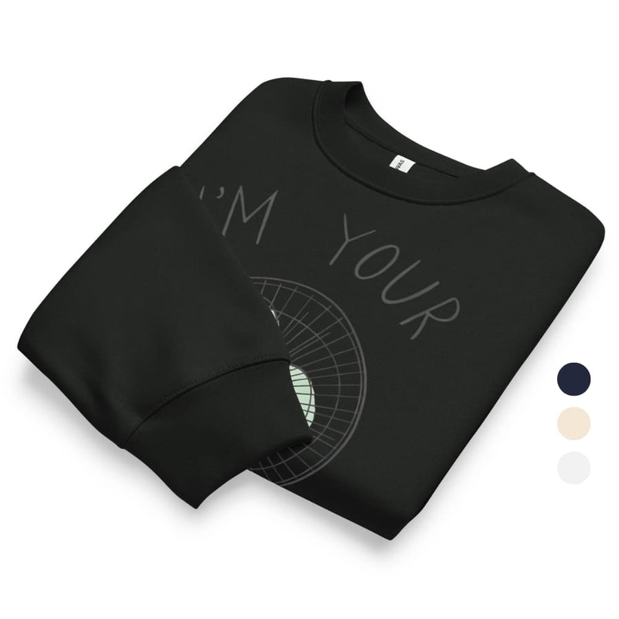 Folded black sweatshirt with text and design on a white background
