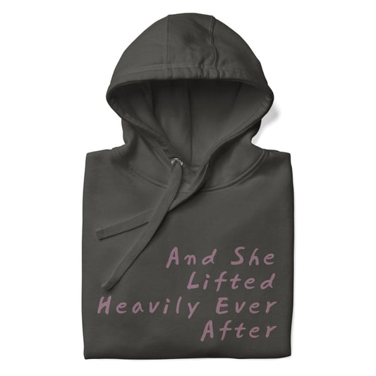 Dark gray hoodie with text 'And She Lifted Heavily Ever After' on a white background