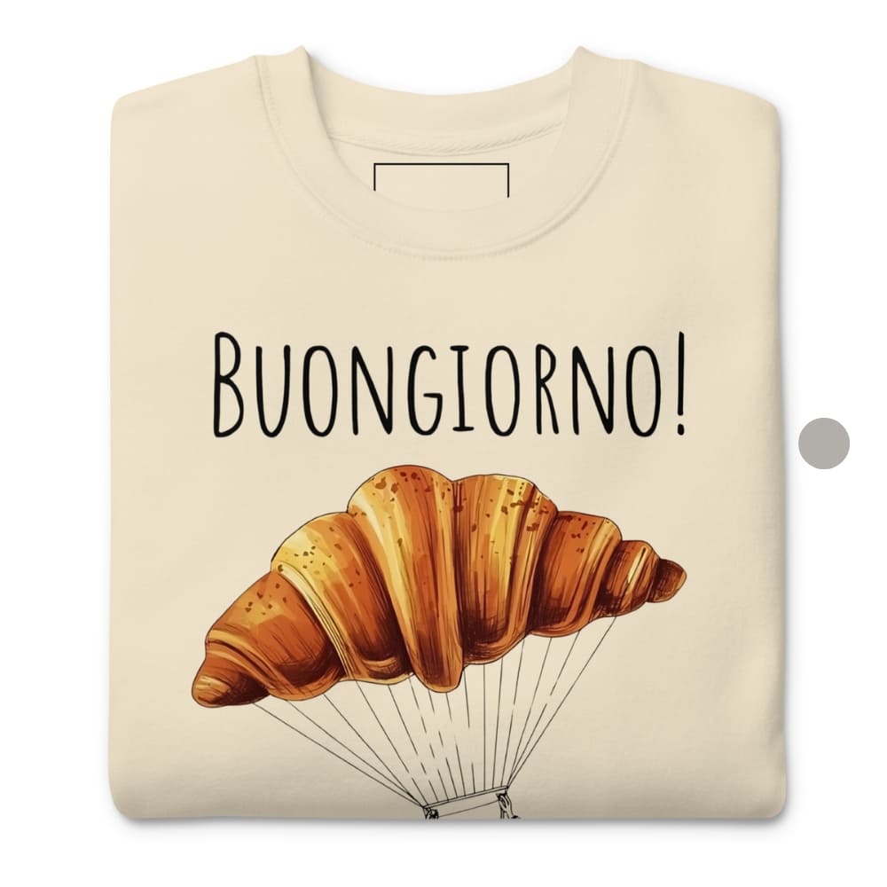 Beige t-shirt with a croissant design and 'BUONGIORNO!' text on a white background