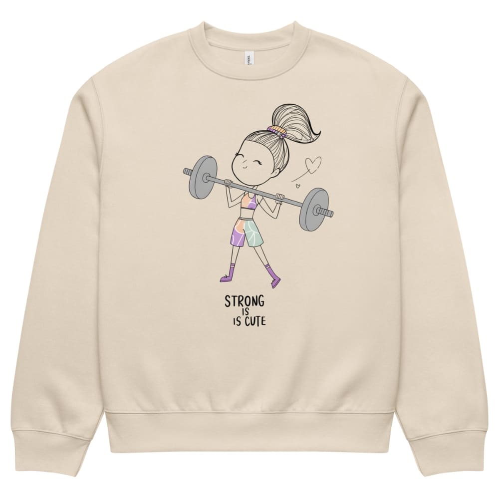 Beige sweatshirt with a graphic of a girl lifting weights and 'Strong is Cute' text on a white background