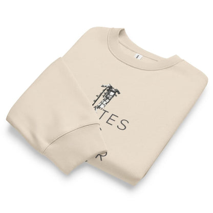 Beige sweatshirt with text and graphics on a white background