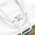 White hoodie with a label on a white background