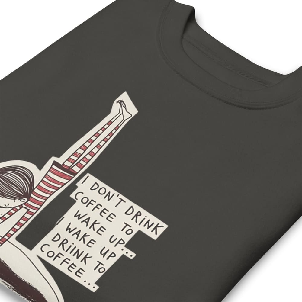 Black t-shirt with a graphic design featuring text and a person in pajama pants.