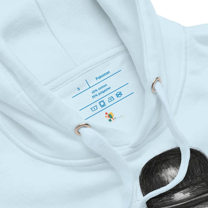 Close-up of a garment label on a white fabric background