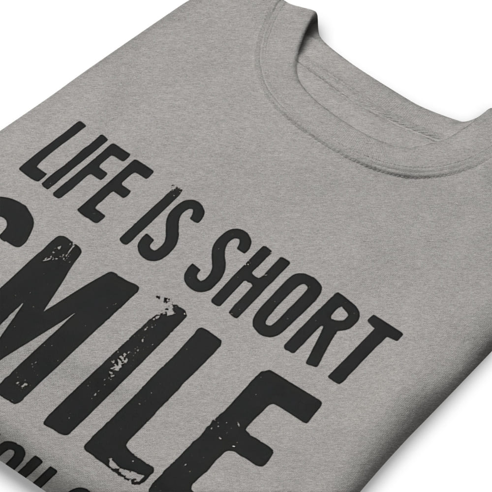 Gray t-shirt with black text 'Life is short, smile' on a white background
