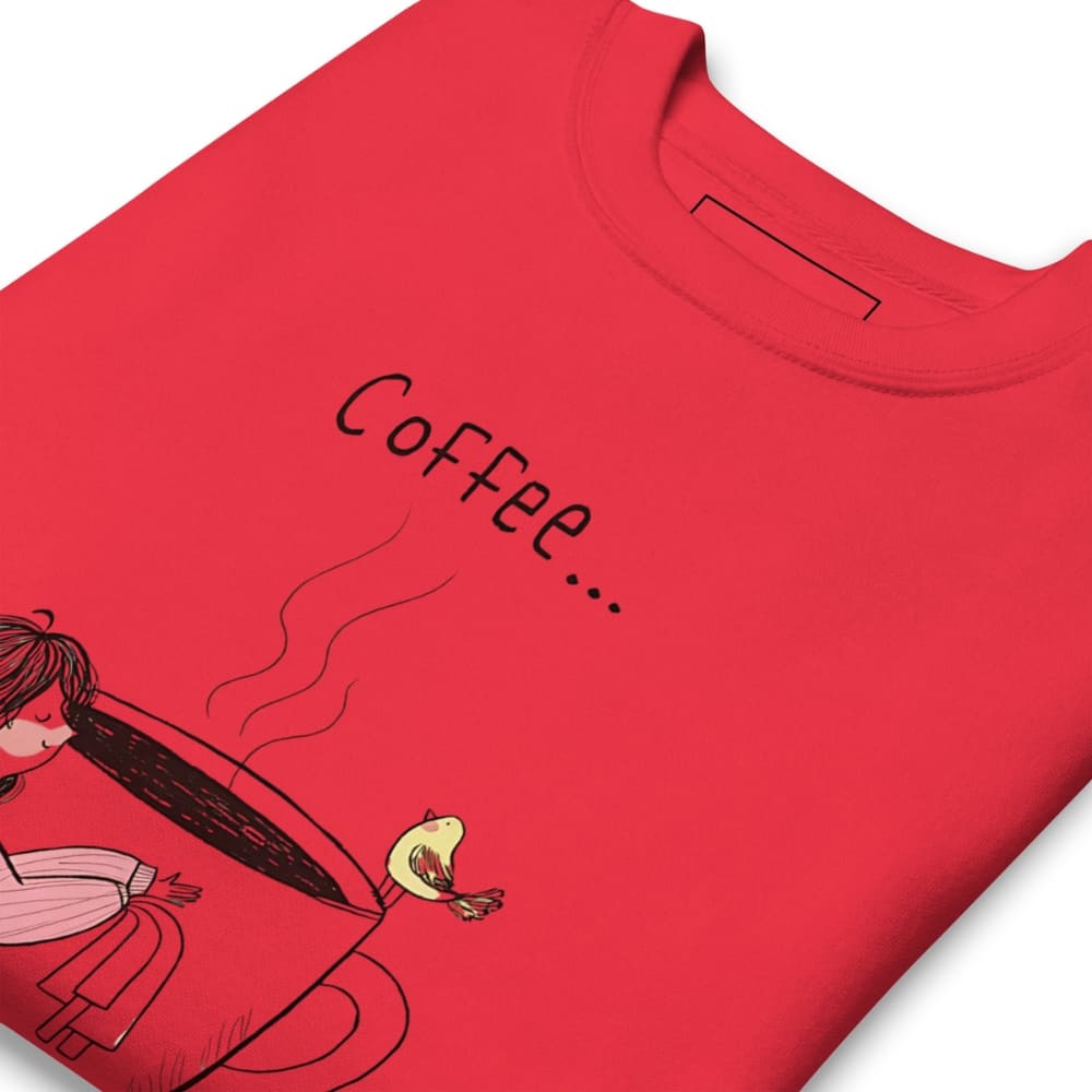 Red t-shirt with a cartoon design of a person holding a coffee cup and the word 'Coffee...' on a white background.