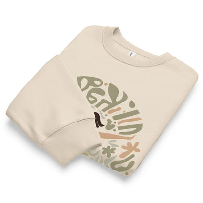 Beige sweatshirt with colorful graphic design on a white background