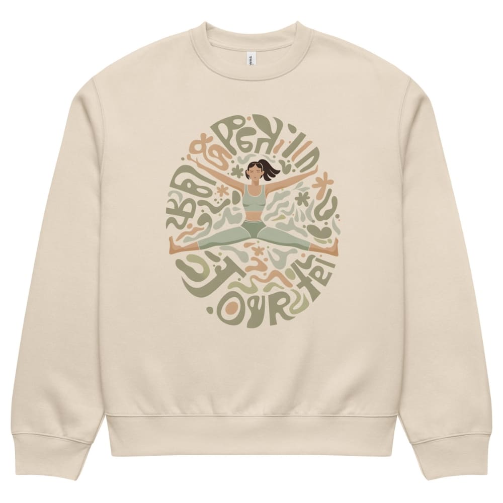 Beige sweatshirt with a graphic of a woman in a yoga pose and text on a white background