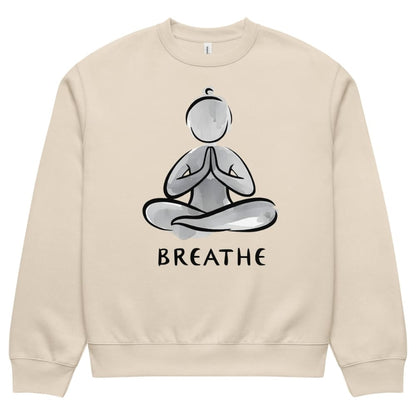 Beige sweatshirt with a yoga pose graphic and 'BREATHE' text on a white background