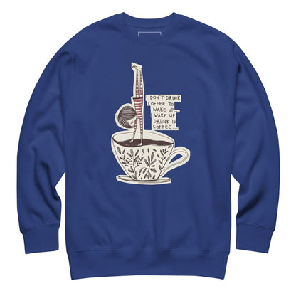 Blue sweatshirt with a coffee-themed graphic on a white background
