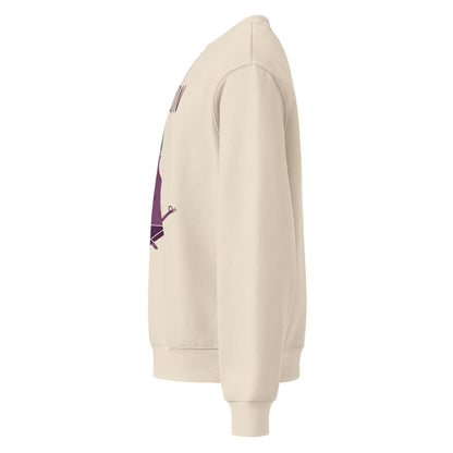 Beige hoodie with a graphic design on the sleeve against a white background