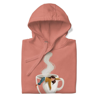 Pink hoodie with a graphic of a person in a coffee cup on a white background