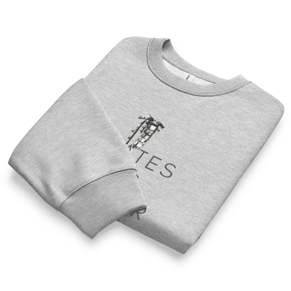 Folded gray sweatshirt with a logo and text on a white background