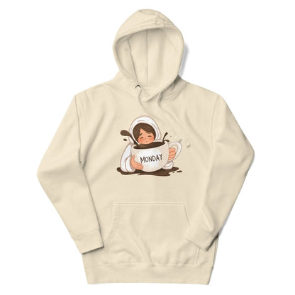 Beige hoodie with a graphic of a person holding a cup labeled 'Monday' on a white background