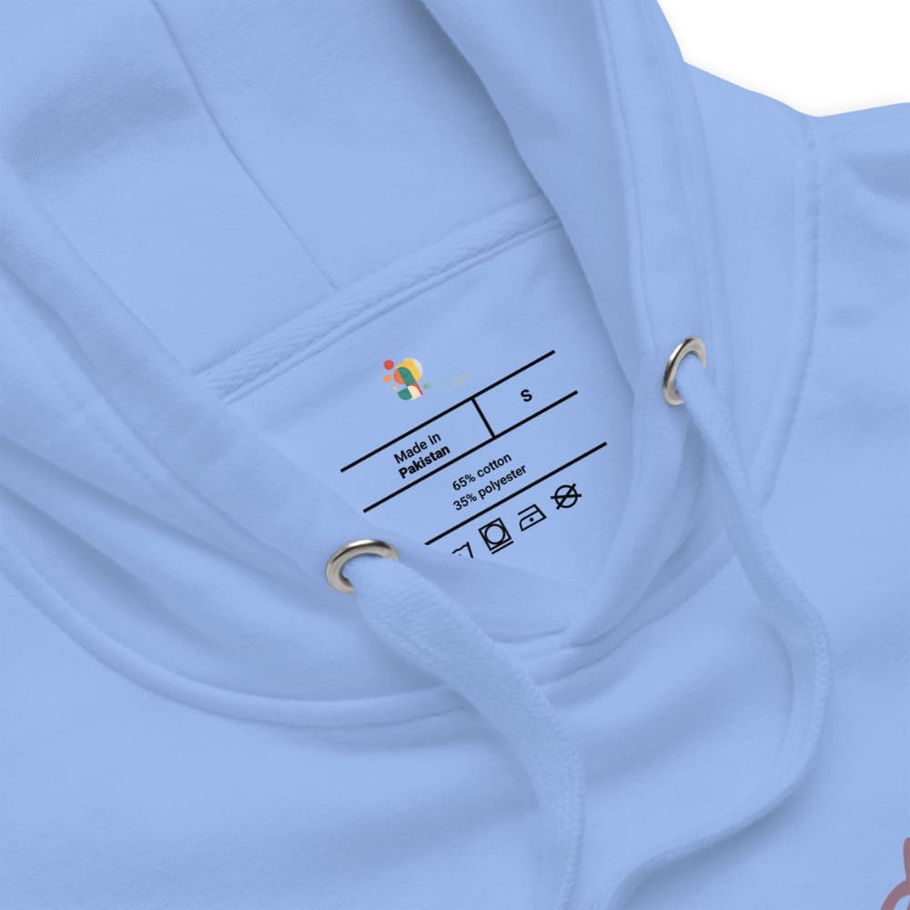 Close-up of a light blue garment with a label on a white background