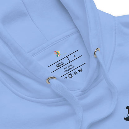 Close-up of a light blue garment with a label on a white background