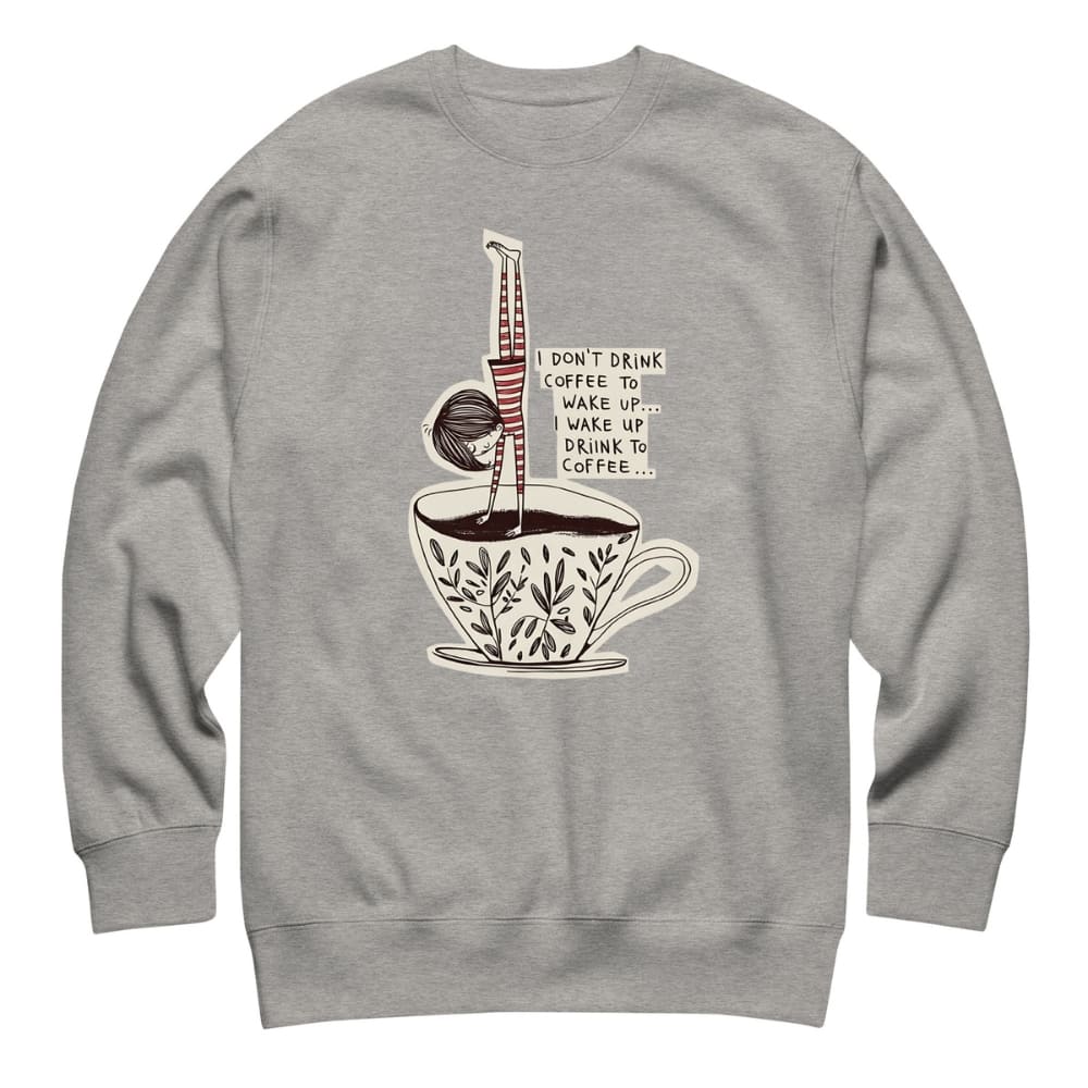 Gray sweatshirt with a coffee-themed graphic design on a white background