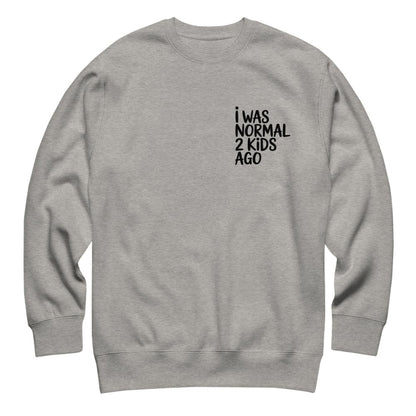 Gray sweatshirt with text 'I WAS NORMAL 2 KIDS AGO' on a white background