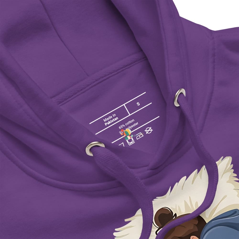 Close-up of a purple hoodie with a label on the chest area.