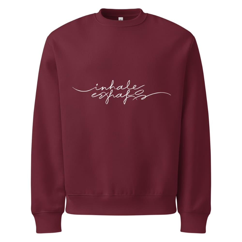 Maroon sweatshirt with 'inhale exhale' text on a white background