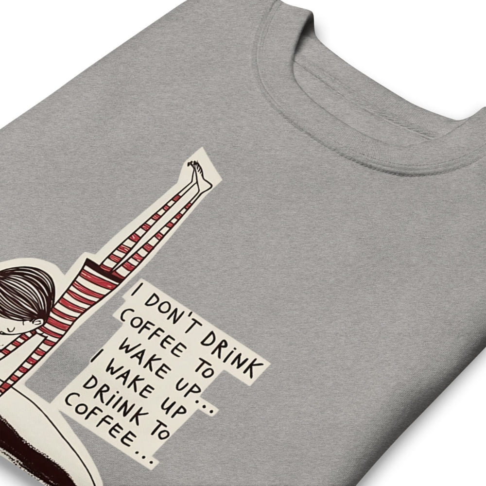 Gray t-shirt with a graphic design featuring text and a person in striped pants.