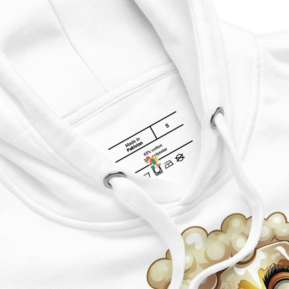 Close-up of a white garment with a label on a white background