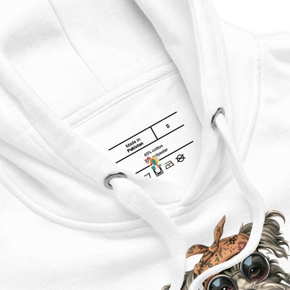 Close-up of a white hoodie with a label and a design of a cat wearing sunglasses and a bandana.