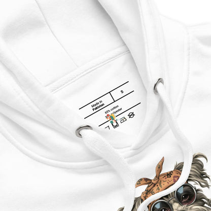 Close-up of a white hoodie with a label and a design of a cat wearing sunglasses and a bandana.