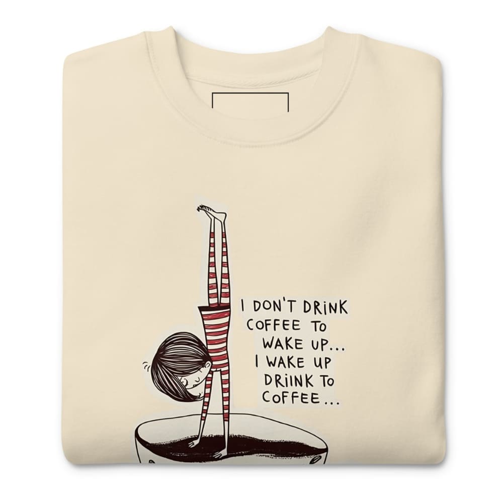 Beige sweatshirt with a graphic of a person doing yoga and text on a white background