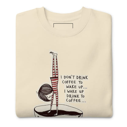 Beige sweatshirt with a graphic of a person doing yoga and text on a white background