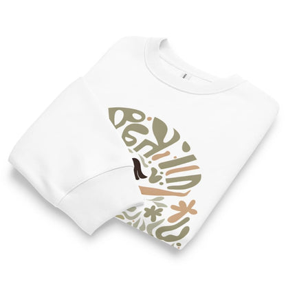 White t-shirt with colorful abstract design on a white background