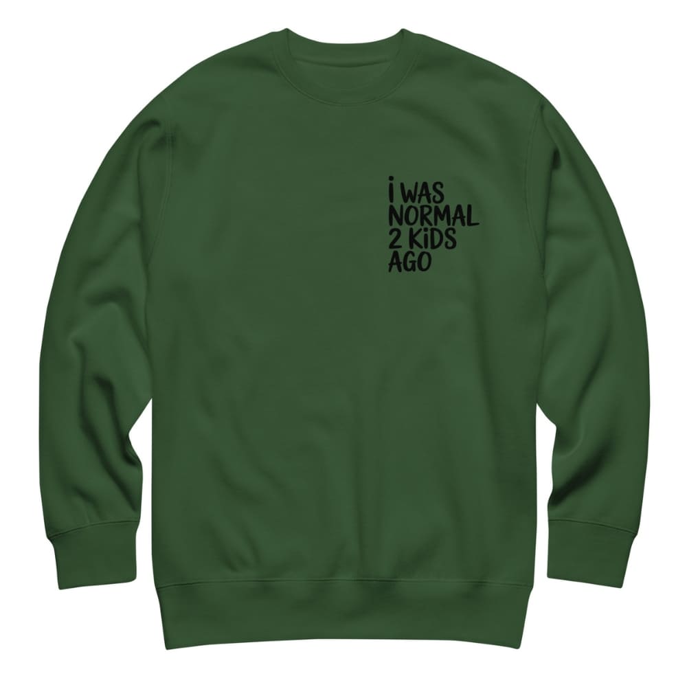 Green sweatshirt with text 'I WAS NORMAL 2 KIDS AGO' on a white background