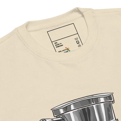 Beige t-shirt with a graphic of a teapot on a white background