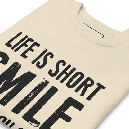 Beige t-shirt with black text 'LIFE IS SHORT SMILE' on a white background