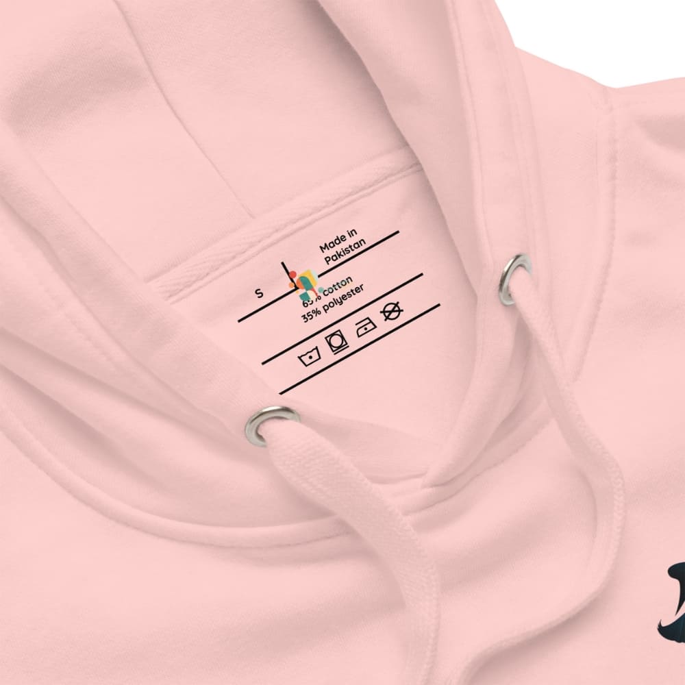 Close-up of a pink hoodie with a label on the chest.