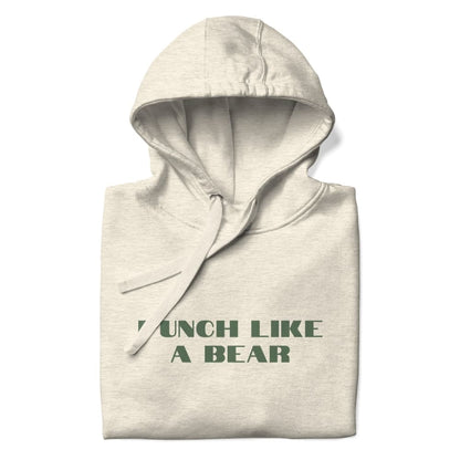 Beige hoodie with 'Punch Like a Bear' text on a white background