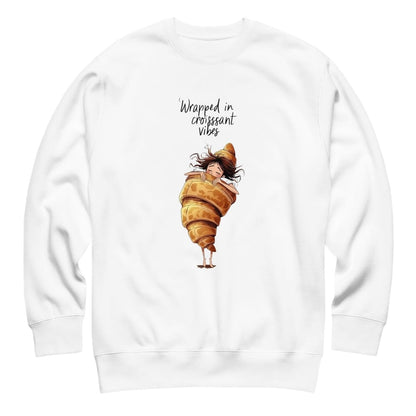 White sweatshirt with a croissant design and text on a white background
