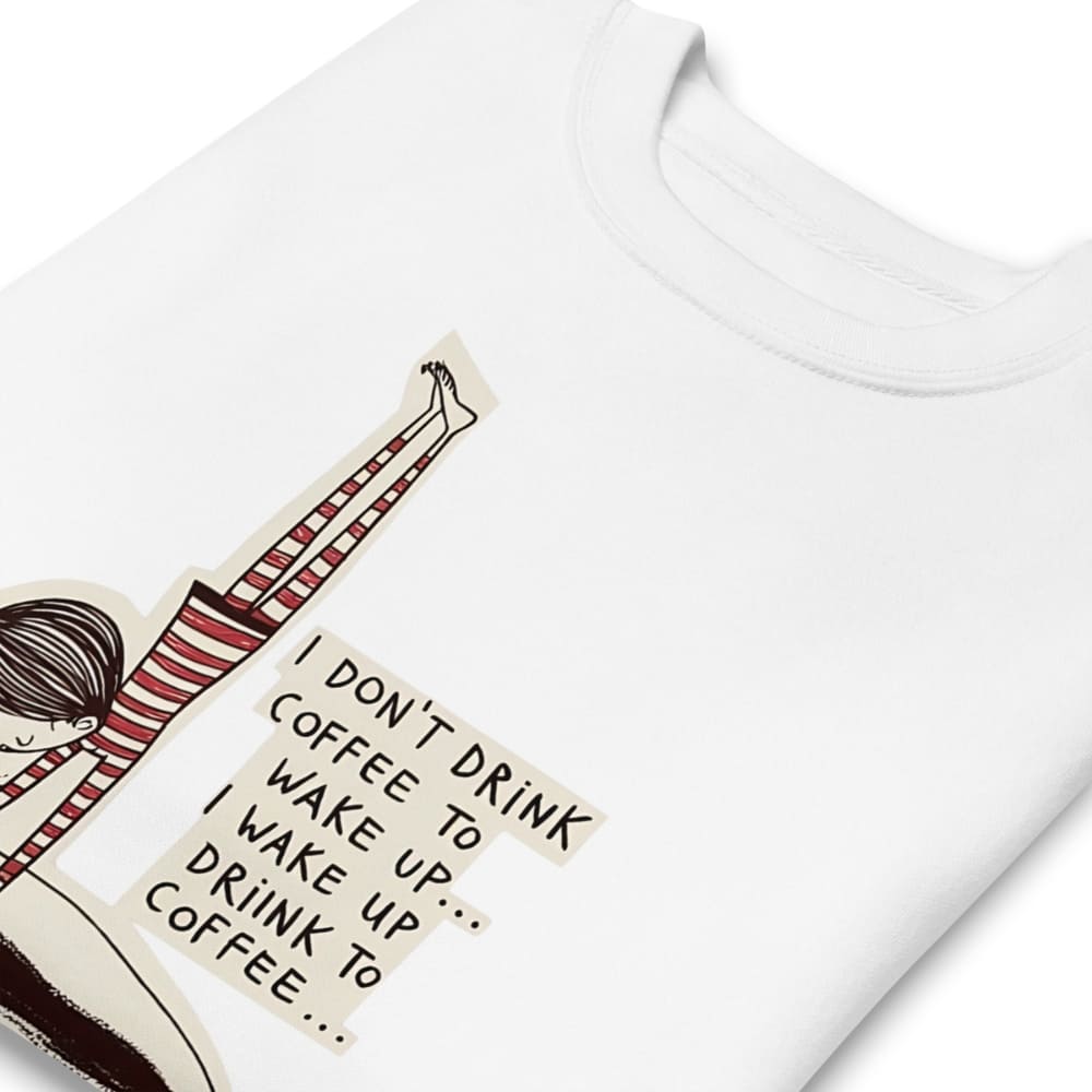 White t-shirt with a graphic of a coffee cup and text 'I don't drink coffee to wake up, I wake up to drink coffee.'