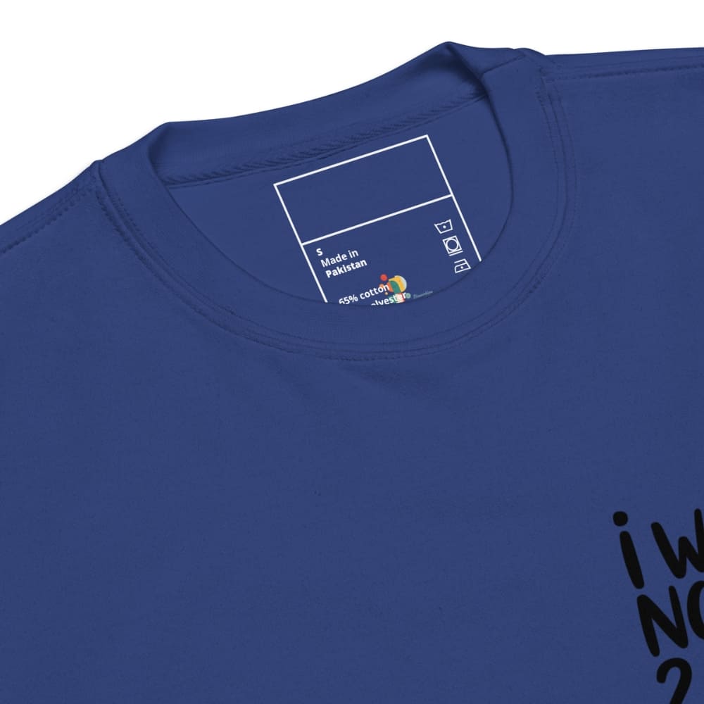 Close-up of a blue t-shirt with a label and text on a white background
