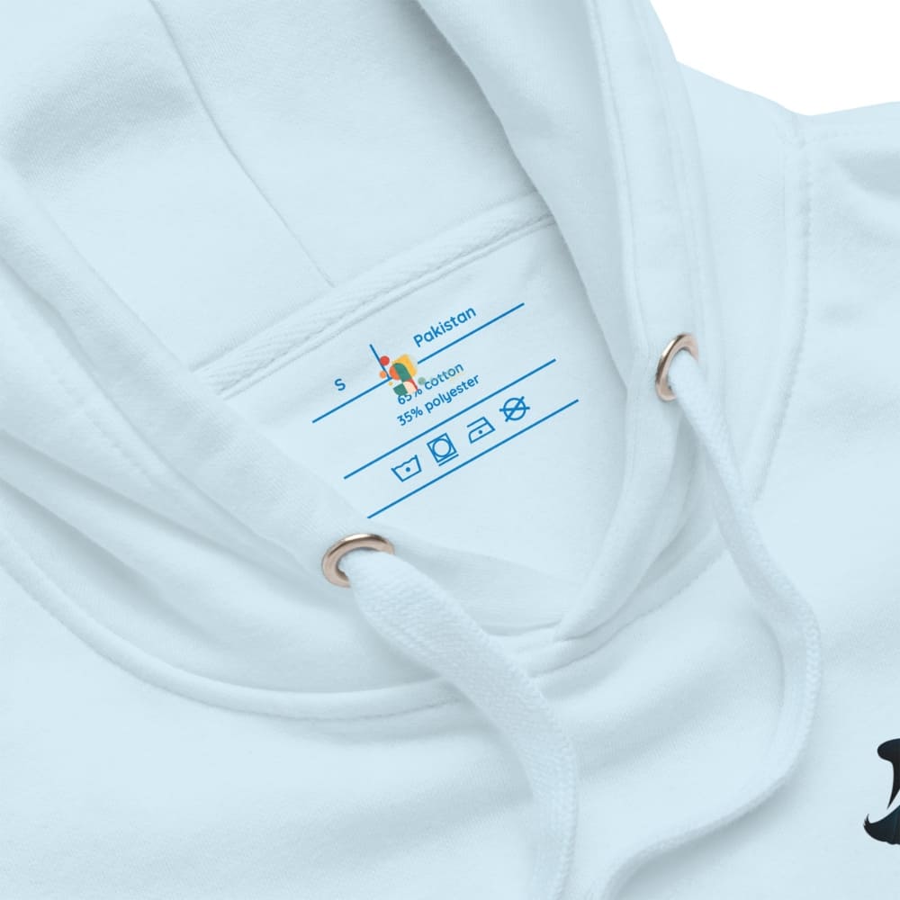 Close-up of a white garment with a label on a white background