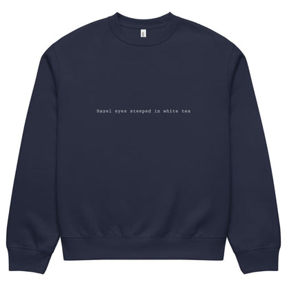 Navy blue sweatshirt with white text on a white background
