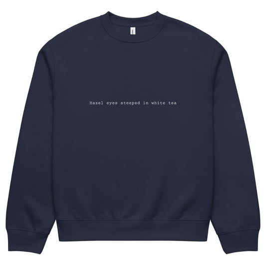 Navy blue sweatshirt with white text on a white background