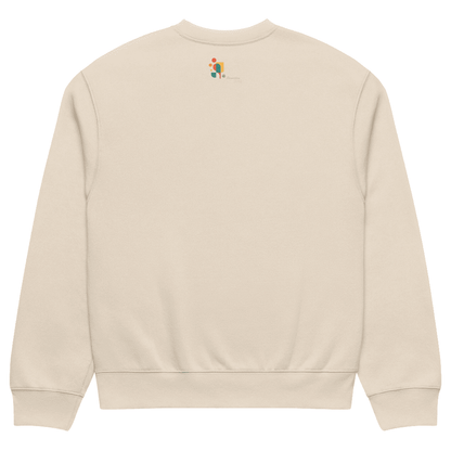 Beige sweatshirt with a small graphic on the back against a white background