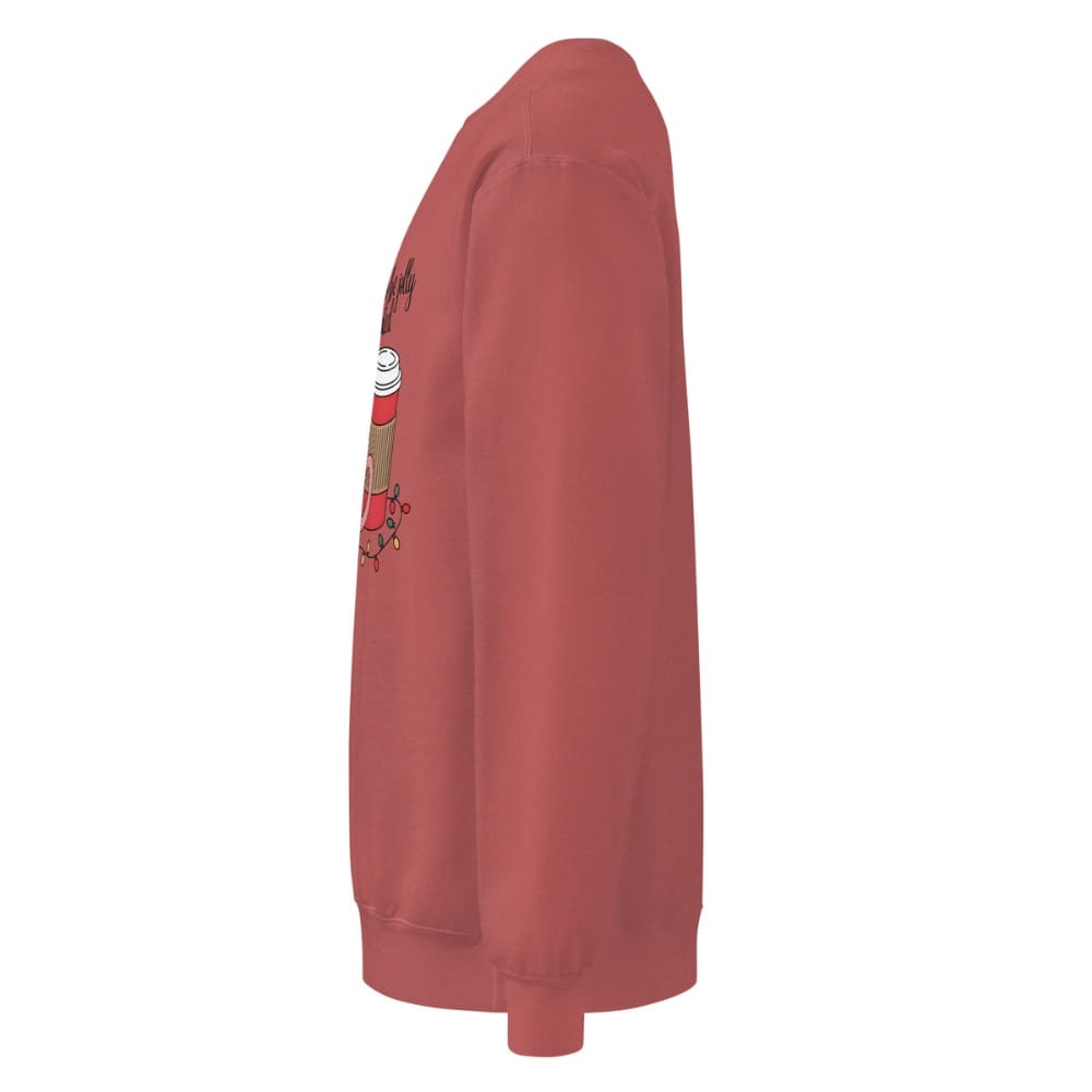 Red sweatshirt with a graphic design on the sleeve against a white background