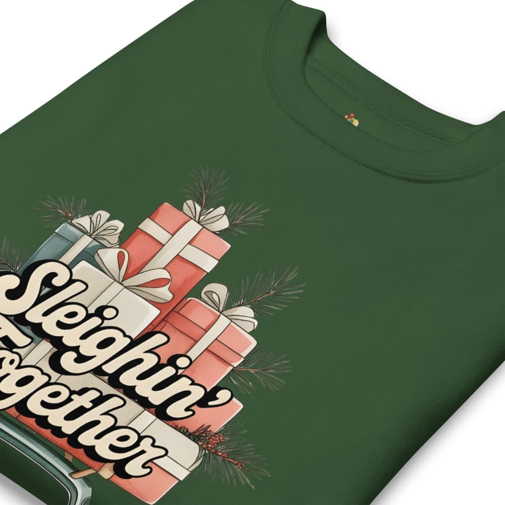 Green t-shirt with Christmas-themed design featuring presents and 'Sleighin' Together' text.