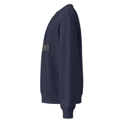 Navy blue sweatshirt with text on the sleeve against a white background